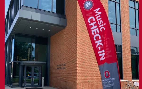 Red and Gray flag that says Music Event Check-in