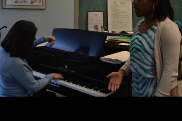 Daina Robinson practicing with Prof. Loretta Robinson. Photo courtesy of Anna Oberla.